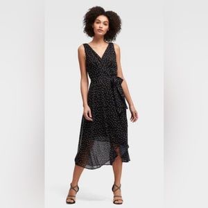 DKNY polka dot dress. V wrap front with belt size 4